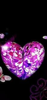 Glamorous phone wallpaper with a pink crystal heart and butterflies on black background.