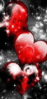 Glamorous mobile wallpaper with glowing red hearts on a starry black background.