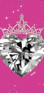 Heart diamond with crown on pink background.