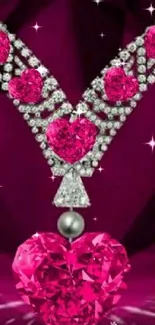 Glamorous necklace with pink heart-shaped gems on elegant wallpaper.