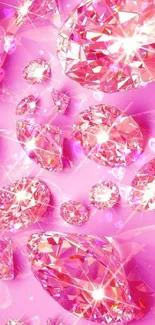 Sparkling pink diamonds with shining facets on a vibrant background.