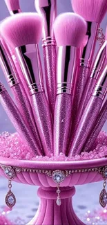 Elegant pink makeup brushes with glittering details.