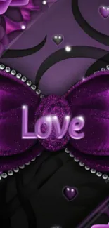 Purple bow with love text and jewels in glamorous style.