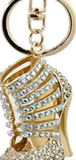 Rhinestone-studded shoe keychain hanging elegantly.