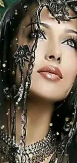 Glamorous woman with jeweled veil in artistic portrait.