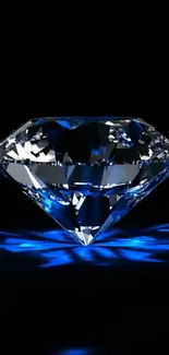 Gleaming diamond with blue highlights on a black background.