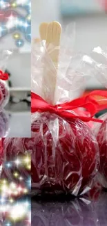 Red candy apples wrapped with red ribbons and sparkles.