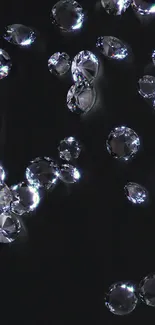 Mobile wallpaper with glistening diamonds on a black background.