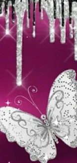 Glittery silver butterfly on magenta background with sparkling accents.