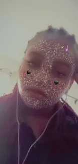 Person with glitter face design on wallpaper.