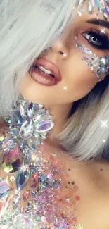 Woman with glitter and jewels on her face and body, creating a glamorous appearance.