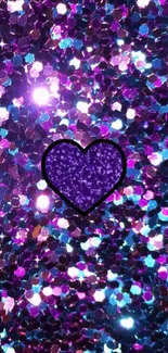 Purple heart surrounded by sparkling blue and purple glitter.