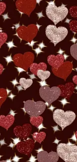 Mobile wallpaper with glitter hearts on maroon background.