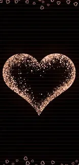 Mobile wallpaper with a copper glitter heart on a black background.