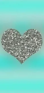 Glittery heart on a teal gradient background