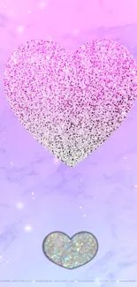 Glitter heart in pastel pink and purple hues.