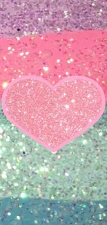 Glittery pink heart on colorful backdrop.