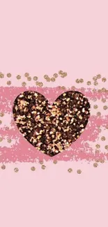 Sparkling glitter heart on pink background wallpaper.