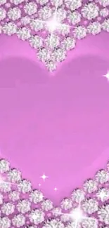 Pink heart wallpaper with glittering diamond effect.