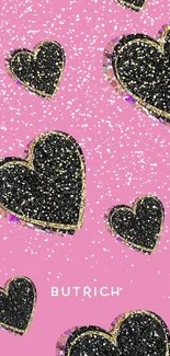 Glitter black hearts on a pink background wallpaper.