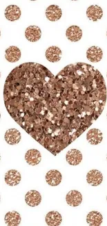 Rose gold glitter heart with polka dots wallpaper.