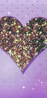 Glitter heart on a purple background with sparkles.