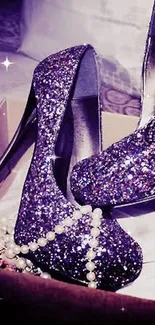 Sparkling glitter high heels in a box with decorative pearls.