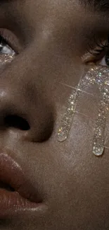 Close-up of a face with glitter tears and sparkling effect.