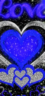 Blue glitter heart on black background.