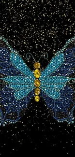 Intricate blue and gold butterfly with glitter on black background.