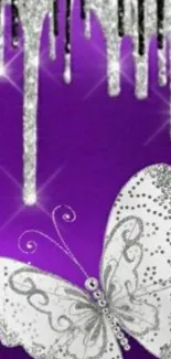 Glittery silver butterfly on vibrant purple background with sparkles.