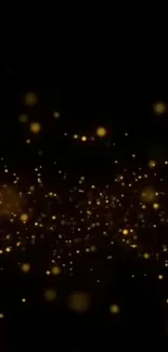 Glittering gold particles on a dark background wallpaper.