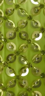 Shimmering green sequins in floral pattern.
