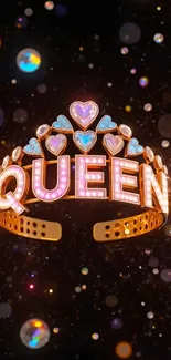 Gold queen tiara with sparkling gems on a glittery background.