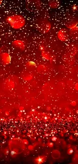 Red bokeh and glitter wallpaper with sparkling highlights.