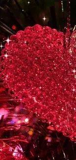 Glittering red heart ornament with sparkles.