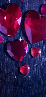 Mobile wallpaper with red glittering hearts on dark background.