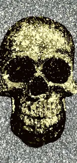 A glittering skull design on a textured gray background.