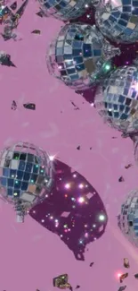 Disco ball wallpaper with pink background.