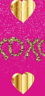 Gold 'xoxo' and hearts on pink glitter wallpaper.