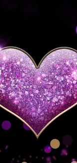 Purple glittering heart on black background wallpaper