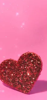 A glittery red heart on a pink background, stylish and romantic.