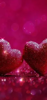 Two glittery hearts on a vivid pink background