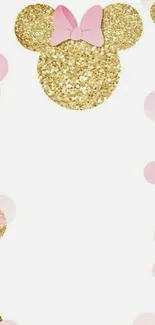 Gold glittery Minnie Mouse silhouette with pink circles.