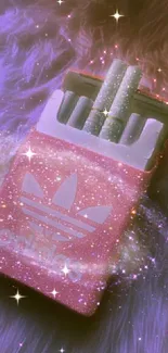 Glittery pink pack of cosmic-themed smoke sticks on fur.