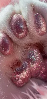 A glittery pink cat paw with sparkles and fluffy fur.