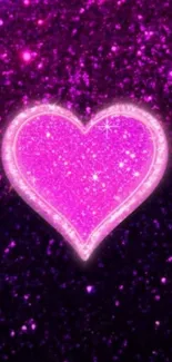 Glittery pink heart on a sparkling background wallpaper.