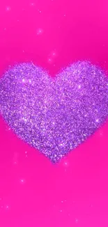 Glittery purple heart on pink background wallpaper.