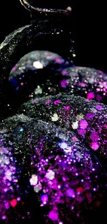 Close-up of glittery purple pumpkin with dark, sparkling texture.