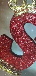 Sparkling red letter S with crown, glitter design.